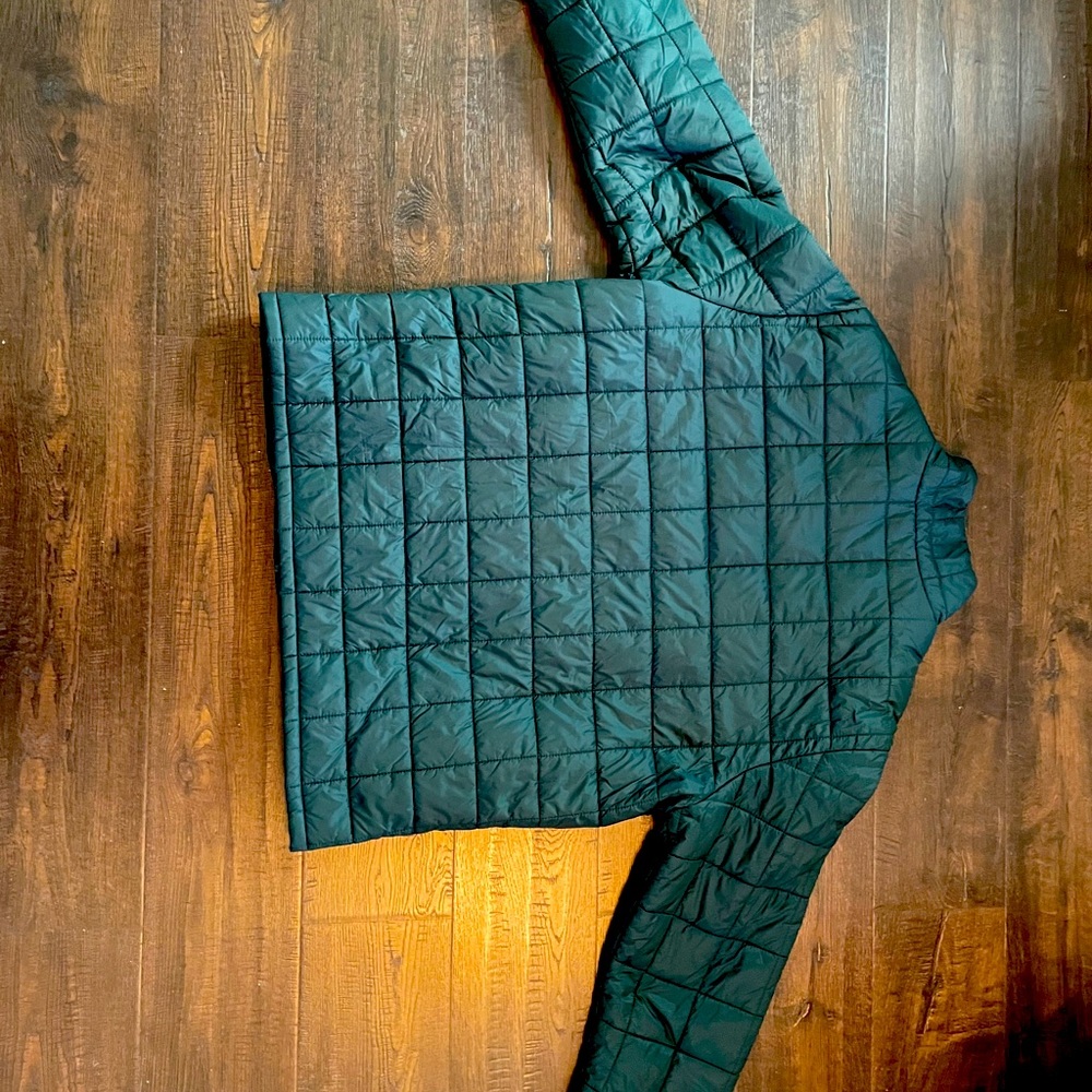 Rain jacket. That folds within itself